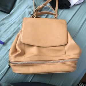 Tan free people convertible backpack